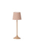 A tall, beige table lamp featuring a round base and a polka-dot lampshade in orange and white stands on a white background. Carefully designed to eliminate small parts that could pose choking hazards, this piece from the Maileg Christmas Set is safely suitable for rooms frequented by children under three.