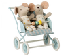 Two stuffed toy mice dressed in polka dot outfits sit side by side in a light blue stroller with four wheels. They each hold onto a colorful bead toy attached to the stroller's handle. Perfect for transport babies or mouse families, the Maileg Stroller, Baby Mice - Mint has a striped fabric seat.