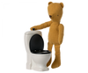 A brown teddy bear stands next to the Maileg Miniature Toilet - Teddy Size, appearing as part of a cute bathroom assortment. The bear's right paw rests on the toilet tank, set against a white background, giving full focus to this charming teddy family scene.