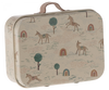 The Maileg Suitcase, Micro is a charming small metal suitcase adorned with whimsical, colorful illustrations of brown horses, green trees, and vibrant rainbows. It is perfect for storing small items and features a beige handle on top for easy carrying.