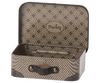 The Maileg Suitcase, Micro is a small metal suitcase beautifully decorated with a brown pattern on both the interior and exterior. Inside, it features an oval label with the word "Maileg," surrounded by colorful illustrations. The handle is embellished with brass studs, adding to its charming design. Ideal for storing small items, this suitcase stands empty and ready for use.