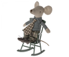 A plush mouse toy dressed in a checkered vest and pants, sitting on a Maileg Rocking Chair - Dark Green designed as mouse furniture, isolated on a black background.