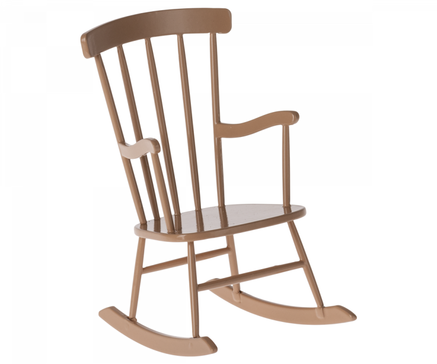 A Maileg Rocking Chair, Mini - Dark Powder (Larger Size) from the bunny furniture collection features a high slatted back, curved armrests, and runners designed for gentle rocking. The timeless design showcases natural wood grain and a slightly curved seat for comfort. This classic piece is positioned at an inviting angle.