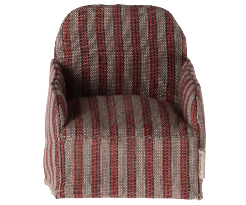 A small, Maileg Chair, Mouse - Striped with red and gray vertical lines, designed in a miniature scale. Perfect for a Gingerbread House setting or to accompany Maileg friends, it features a cushioned seat and backrest ideal for dollhouse or miniature room displays.