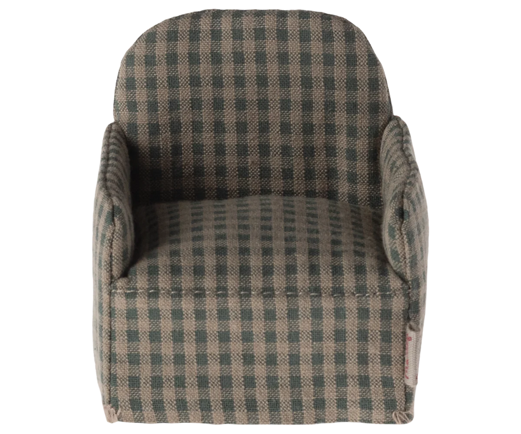 The Maileg Chair, Mouse - Green Checker, is a charming checkered fabric armchair in shades of green and beige with a rounded back and compact design, ideal for hosting your Maileg friends.