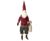 A Maileg Large Santa (Size: 45.27 in.) with a tall red hat, bushy white beard, burgundy lambswool sweater with patterned sleeves, green trousers, and brown boots. The Maileg Large Santa holds a beige sack tied with a blue belt. This charming Christmas figurine doubles as an adorable Santa decoration.