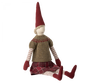 The Maileg Christmas Maxi Pixy is a charming cloth doll from the Maxi Pixies collection. It showcases a pointed red hat, a green knitted sweater, and a plaid skirt. With its striped legs and red mittens, this festive decoration is crafted from exclusive materials to enhance its whimsical appeal. The minimal facial details contribute to its endearing charm.