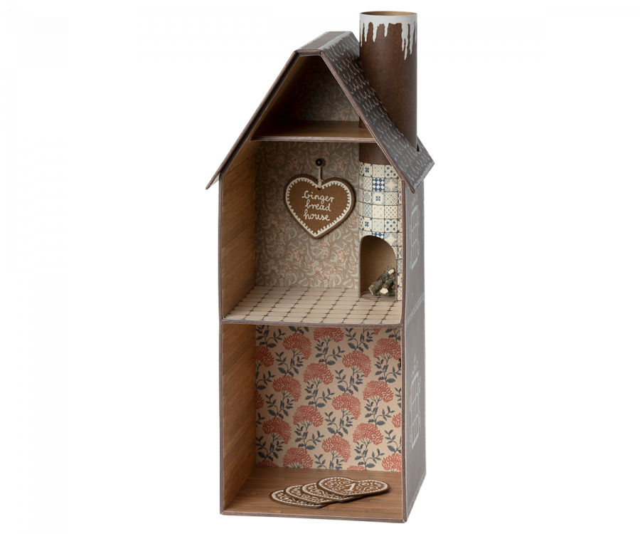 A decorative wooden dollhouse styled as a Maileg Cardboard Two-Story Gingerbread House with detailed interior wallpaper and a welcoming sign that reads "Gingerbread House.