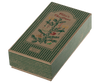 An elegant rectangular gift box with a vintage flair showcases green and beige stripes. The top is adorned with an illustration of a Christmas tree embellished with metal ornaments and candles. The lid features the text "Petit Noël" alongside the brand name "Maileg," adding charm to this delightful Maileg Peter's Christmas Ornament Set (2024).