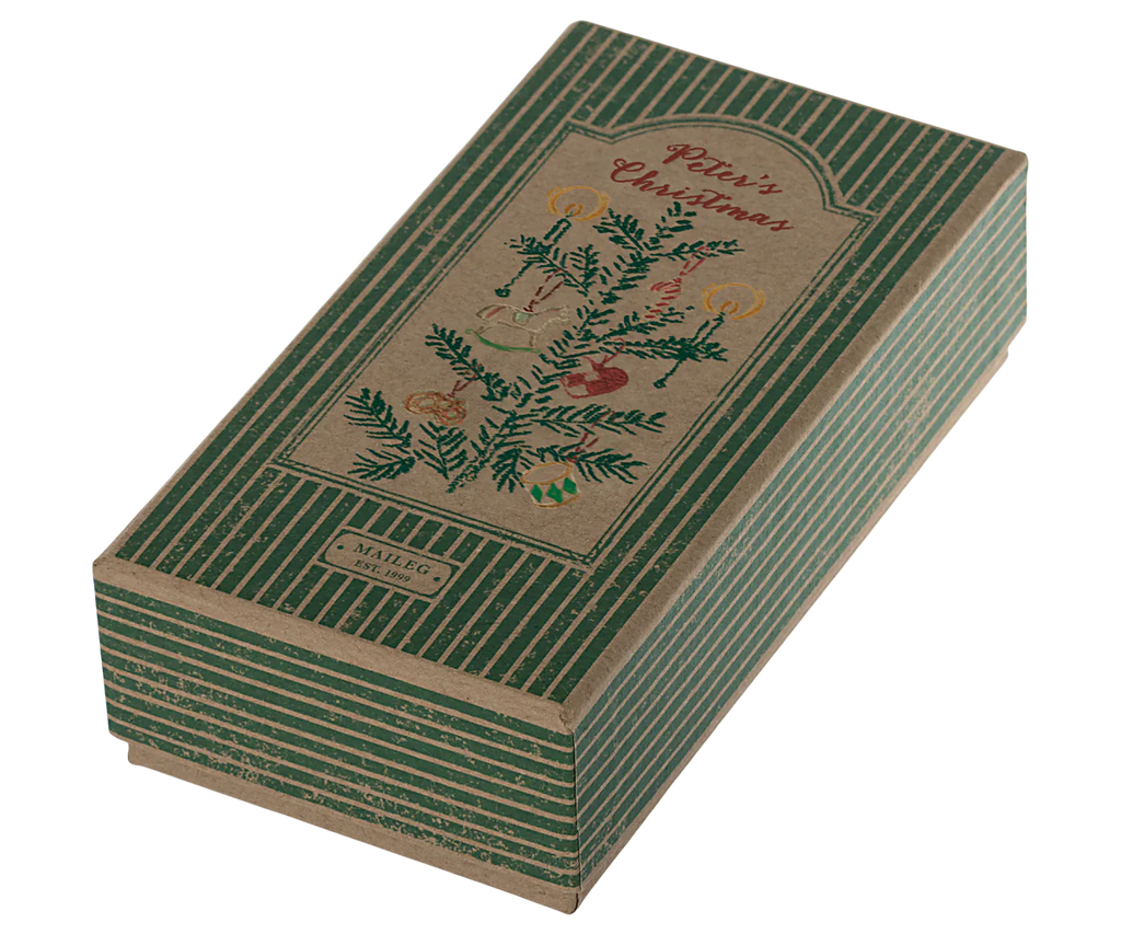 An elegant rectangular gift box with a vintage flair showcases green and beige stripes. The top is adorned with an illustration of a Christmas tree embellished with metal ornaments and candles. The lid features the text "Petit Noël" alongside the brand name "Maileg," adding charm to this delightful Maileg Peter's Christmas Ornament Set (2024).