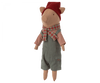 The Maileg Christmas Pig - Boy is a snuggly toy dressed in a red and white striped shirt, grey overalls with pockets, a red and green checkered scarf, and a matching red hat. Perfect for holiday decoration, the pig stands upright facing forward and features a removable hat for added fun.