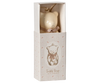 Product Description: The Maileg Metal Ornament, Teddy Bear in Off White/Rose is beautifully presented in a decorative box adorned with an illustration of a teddy bear and the phrase "Teddy Bear Metal Ornament." Featuring charming handpainted details, this cream-colored ornament comes with a small ribbon and is securely packaged.