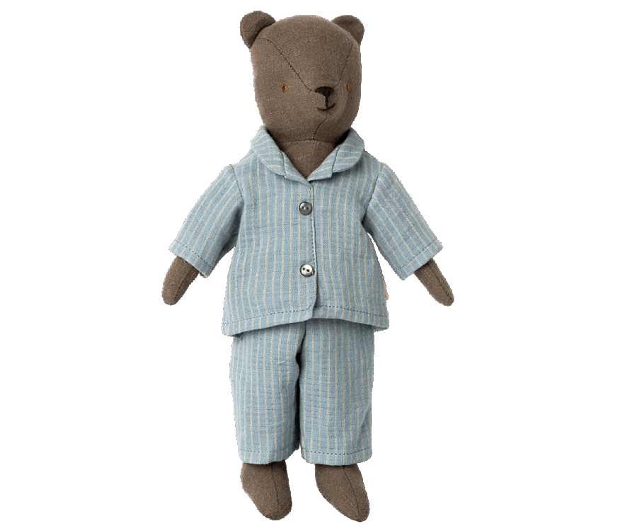 Meet Teddy Dad, a charming stuffed bear dressed in the Maileg Extra Clothing: Pyjama for Teddy Dad, featuring a light blue and white striped pajama set complete with buttons. His dark brown fur beautifully complements the top's collar. This adorable ensemble is perfect for display; note that the outfit is available for purchase separately.