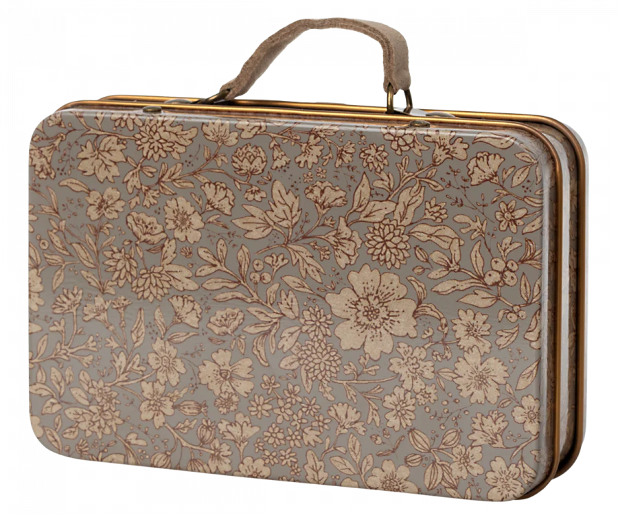 A Maileg Puppy Accessories - Rose with a floral pattern in shades of brown and beige. It has a sturdy handle on top, gold-colored metal edges, and could easily fit the matching collar and leash for an elegant, classic appearance.