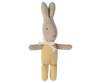 A Maileg My Rabbit - Yellow toy with beige fabric, wearing a yellow and white checkered outfit. It has a white polka-dotted bow around its neck, with arms extended sideways and a stitched face showing a small, gentle smile—perfect for any rabbit family or as one of your must-have accessories.