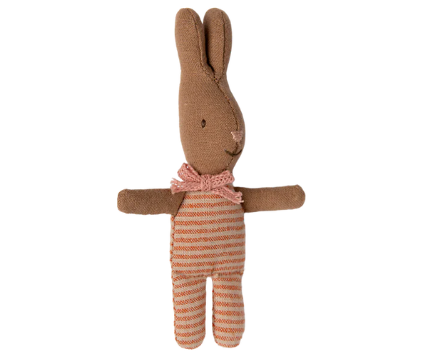 Introducing the Maileg My Rabbit - Stripes, a plush bunny made from soft brown fabric and adorned with a charming pink bow tie. This delightful rabbit boasts embroidered eyes and nose, complemented by charming striped orange and white legs. It's perfect for adding a whimsical touch to any cozy nook!