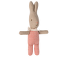 The Maileg My Rabbit - Red Check is a fabric bunny toy featuring beige ears, a smiling face, and an outfit in red and white checkered pattern, complete with charming rabbit-themed accessories like a small white scarf.