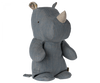 A worn, blue denim fabric Small Maileg Rhino stuffed toy with visible stitching and soft fabric horns, part of a safari friends collection, standing against a black background.