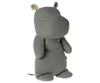 A soft, grey Maileg Medium Hippo Stuffed Animal - Chino Green made from recycled polyester, with subtle polka dots on the inner ears, standing upright on a white background. The toy has a gentle, calm expression.