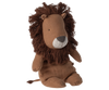 The Maileg Lion Stuffed Animal, part of the delightful Safari Friends collection, sits upright with a large brown mane. It boasts handmade details such as embroidered eyes, nose, and mouth on its light brown face. The body, mane, and tail are made from soft fabric.