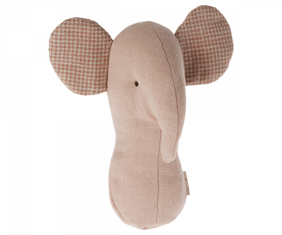 A Maileg Lullaby Friend Rattles, Elephant - Rose with a simple design. The light pink body and large ears feature unique prints in a pink and white checkered fabric. The elephant's trunk is slightly curved, and it has two small black dots for eyes.