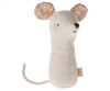 A fabric mouse toy with a beige body and floral-patterned ears, crafted from soft fabrics. The toy features a simple stitched face, a small tail, and is part of the charming Maileg Lullaby Friend Rattles, Mouse - Nature collection. A small tag is attached to its side for an added touch.