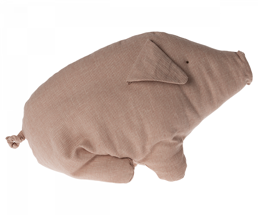 A plush toy resembling a pig is shown. The Maileg Polly Pork, Medium is light brown with a checked pattern, featuring a snout, two floppy ears, a small black eye, and a curly tail. Its round, soft body made from soft fabric and recycled polyester filling gives it an exceptionally cuddly appearance.