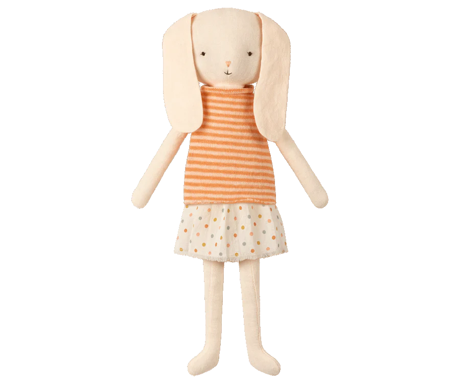 Meet the Maileg Best Friend - Bunny: a soft toy rabbit with long floppy ears, dressed in a sleeveless orange and white striped top and a white skirt adorned with orange polka dots. With its simple, stitched face featuring small eyes and a nose, it makes the perfect companion for all ages.