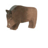 A small wooden figurine of a wild boar with a brown, polished finish, perfect for imaginative play. The handcrafted details illustrate the texture of the wild boar's fur and features as it stands with its head slightly lowered. This charming piece is reminiscent of high-quality Ostheimer brand toys.