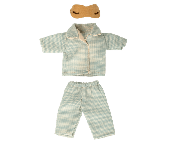 A small set of green-and-white checkered Maileg Extra Clothing: Pajamas for Dad Mouse with a collared top and matching pants, made from the softest cotton. An additional light brown eye mask with eye shapes drawn on it is also visible above the pajamas.