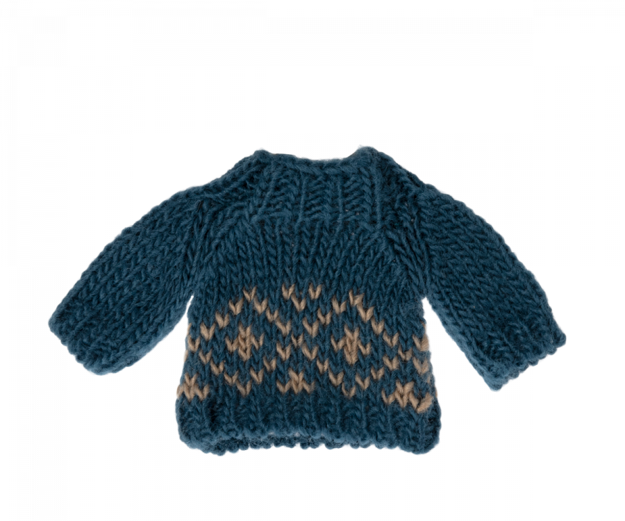 The Maileg Extra Clothing: Christmas Knitted Sweater for Dad Mouse is a small, blue knitted sweater with long sleeves and a round neck. This cozy, thick sweater features a Scandinavian pattern of beige diamond shapes near the bottom hem, making it perfect for cold weather.