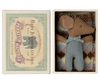 A small, brown fabric baby mouse with a bow tie, dressed in overalls, lies in a colorful matchbox labeled "Maileg Sleepy Wakey Baby Mouse In Matchbox - Blue" alongside a knitted blanket. The Maileg matchbox features vintage-style packaging with an elephant illustration.