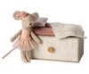 The Maileg Dancing Mouse in Daybed is dressed in a tutu and floral headband, appearing ready for a dance lesson, while standing beside a compact striped box featuring a round, gold-colored knob. The box is beautifully decorated with a pink cushion and a cream-colored knitted blanket.