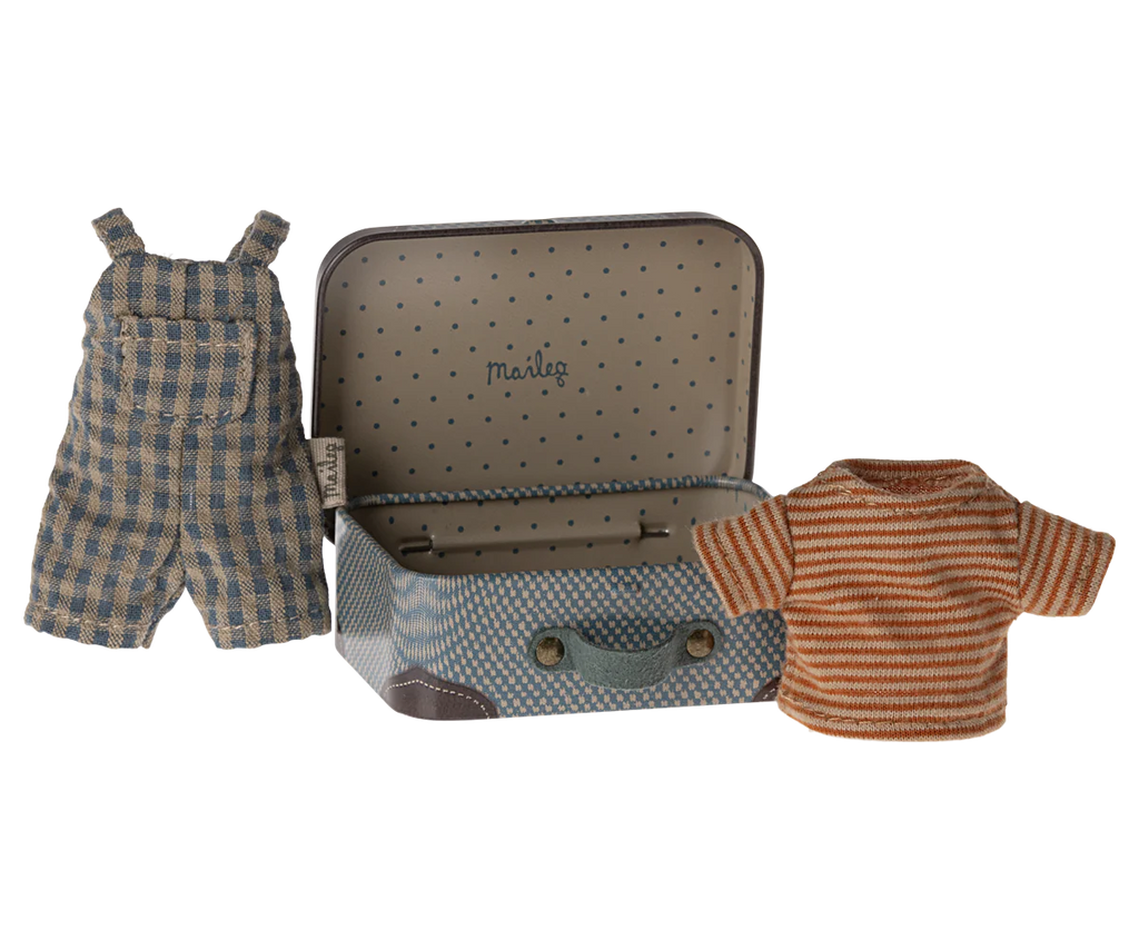 A small polka-dotted suitcase is open, revealing a label with the word "Maileg Overalls And Shirt In Suitcase, Big Brother Mouse." Next to the suitcase are a pair of blue checkered overalls and a striped red and beige short-sleeved shirt, both doll-sized. Recommended age for this charming set is 3 years and up, making it perfect for any big sister or brother.