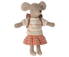 A Maileg Big Sister With Backpack - Coral with large, round ears is dressed in a cream and pink striped sweater, a pink and white checkered skirt, and has a small brown backpack. The kindergarten-ready mouse is standing with arms outstretched.