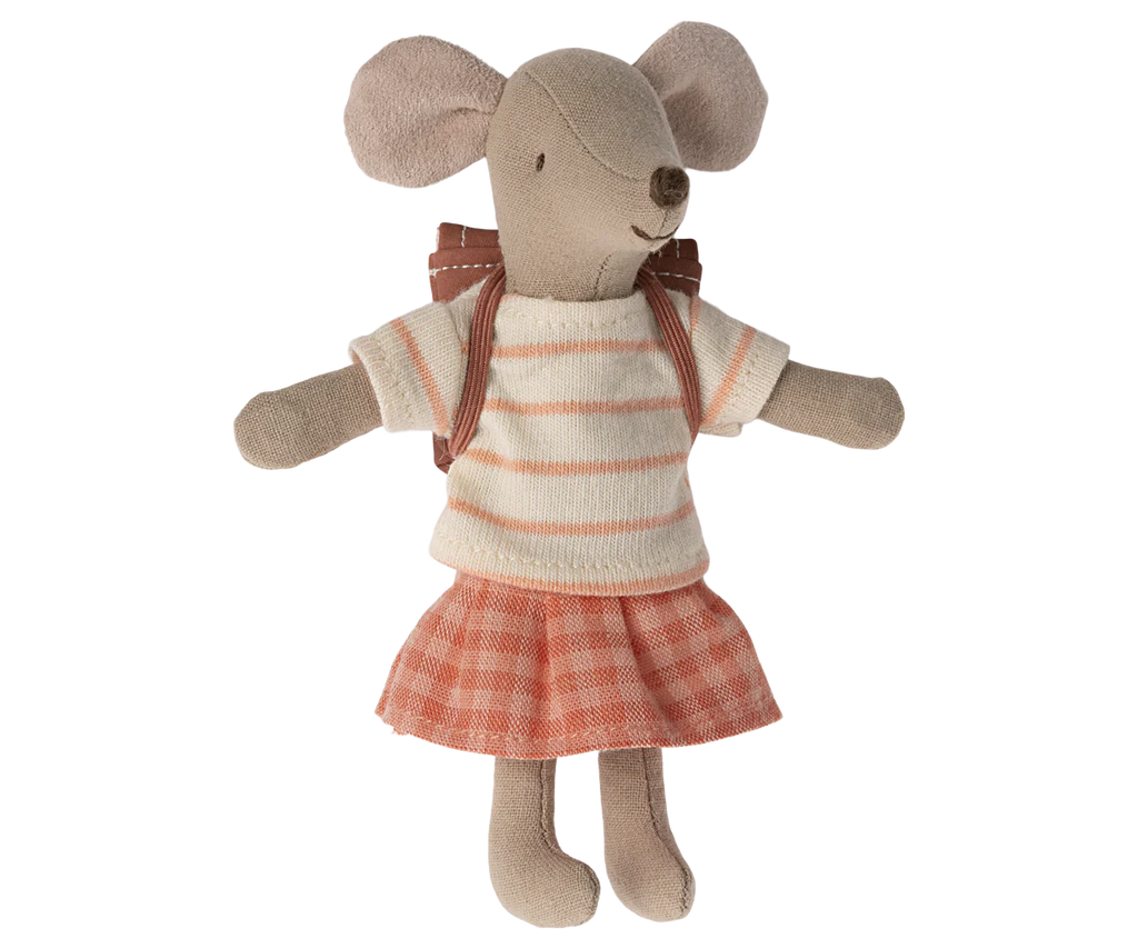 A Maileg Big Sister With Backpack - Coral with large, round ears is dressed in a cream and pink striped sweater, a pink and white checkered skirt, and has a small brown backpack. The kindergarten-ready mouse is standing with arms outstretched.