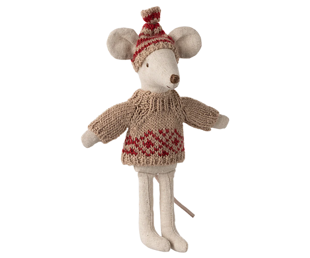 A plush mouse toy stands upright, dressed in the delightful Maileg Knitted sweater and Hat set for Mom Mouse. It features a cozy soft knitted beige sweater adorned with red patterns and is topped with a matching red and beige hat, exuding warmth. This charming outfit is perfectly suited for the big sister or big brother to enjoy during the chilly months.