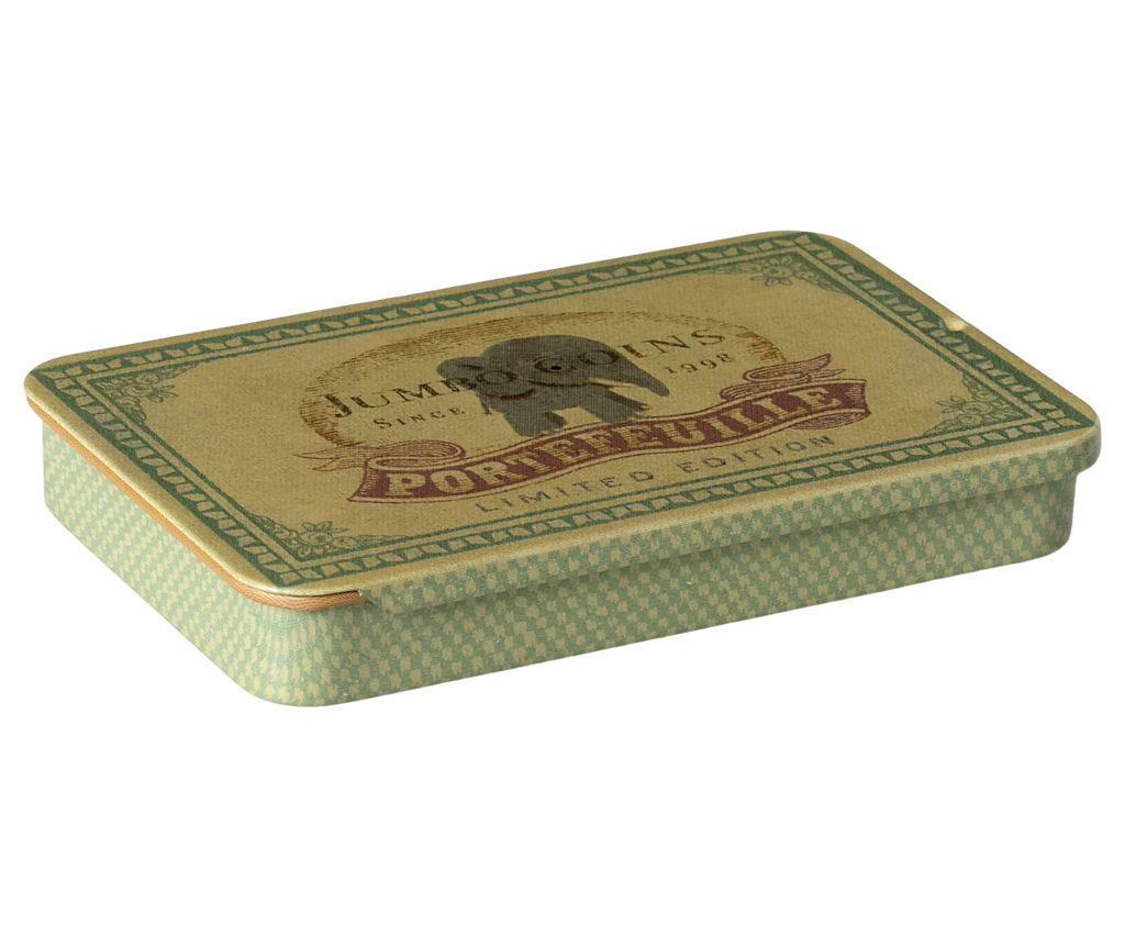 The Maileg Metal Box with Sliding Lid is a rectangular, vintage-style storage container featuring a beige lid adorned with an illustration of an elephant and the text "Jumbo Mints Since 1896 Pure Fruit Limited Edition." The sides of the metal box are green with a subtle pattern.