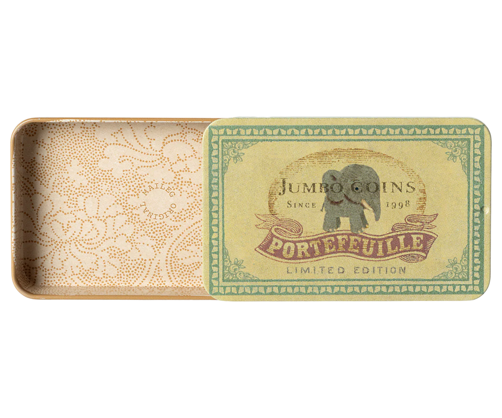 The Maileg Metal Box with Sliding Lid, partly open to reveal a decorative interior, serves perfectly as a gift card box. The lid design features an illustration of an elephant with the text "Jumbo Coins Since 1998," "Portefeuille," and "Limited Edition." Inside, an intricate floral pattern lines the metal box.