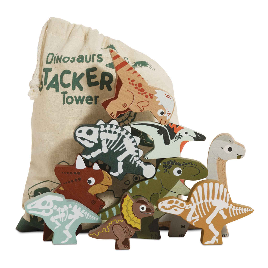 The Jurassic Stacking Dinosaurs set, made from FSC-certified wood, showcases uniquely painted dinosaurs in front of a "Dinosaurs Stacker Tower" drawstring bag adorned with dinosaur images.