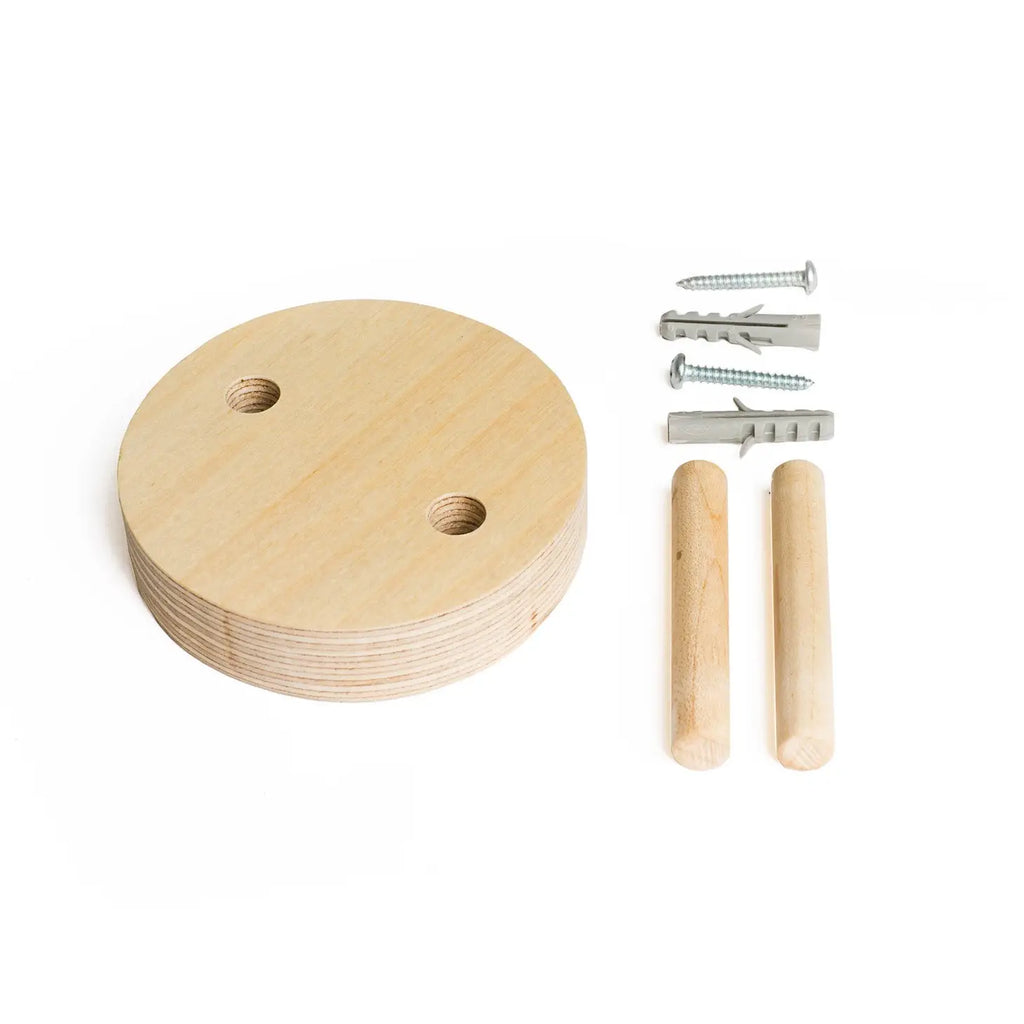 The Guitar Wall Hanger For Loog Mini includes a wooden round disc with two holes, two wooden dowels, screws, and plastic wall anchors, all against a white background. It's perfect for stylishly and securely displaying your Loog Mini or Loog Pro guitar.