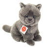 Meet the Teddy Hermann Gray Sitting Cat Stuffed Animal, a plush toy featuring a gray cat with blue eyes. This high-quality plush has a soft, furry texture and sits upright. A white tag attached to its neck reads "Lelly Kelly" with additional text beneath it. This child-friendly stuffed animal is perfect for cuddles and playtime.