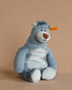 A Steiff Disney's "Jungle Book" Baloo Bear plush toy, characterized by its delightful tag that perfectly captures Baloo's charming character.