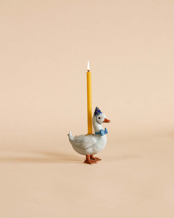 Goose in a party hat candle holder