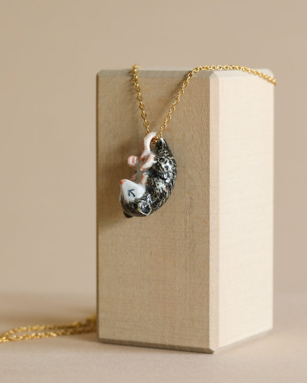 Possum necklace with gold chain