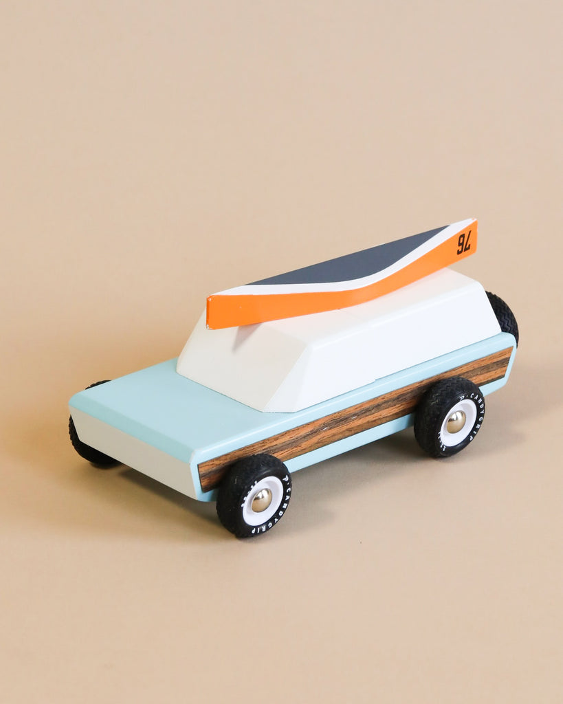 wooden car toy with canoe