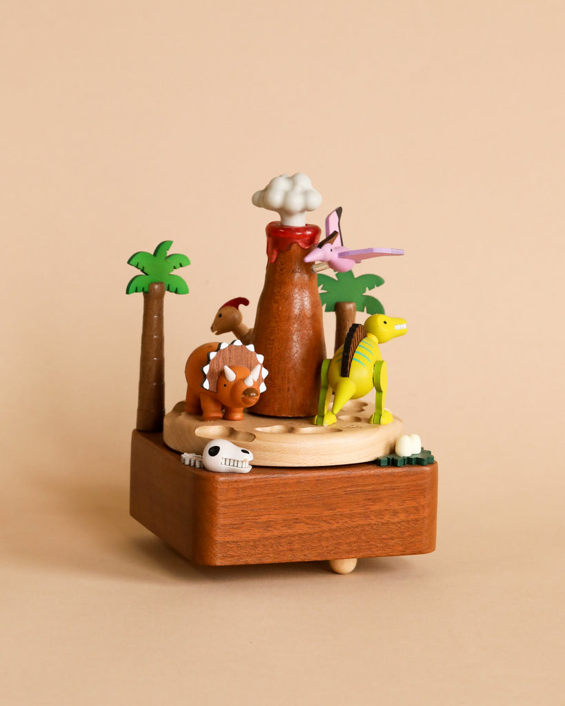 Dinosaur and volcano themed wooden music box