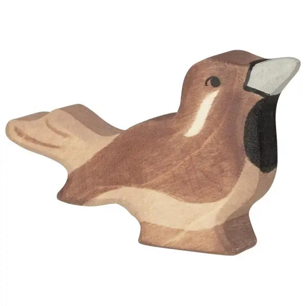 A high-quality carved wooden bird figurine with a brown body, black markings around its eyes, and a light-colored beak. This Holztiger Sparrow Bird figure is handcrafted from wood, depicting the bird in a standing position with its tail slightly raised.