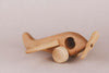 Introducing the Handmade Wooden Airplane, thoughtfully crafted with fixed wheels and a propeller. This timeless toy features a minimalist design and is made from light-colored wood finished with natural linseed oil, highlighting its stunning grain and texture against a neutral backdrop.