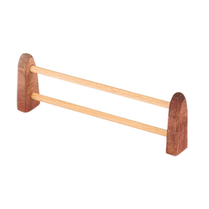 A handcrafted Ostheimer Fence, Small with two horizontal rods connecting two vertical end supports. The end supports are slightly curved at the top and made from a darker wood, while the rods are a lighter wood color, perfect for imaginative play. This design complements Ostheimer toys beautifully.